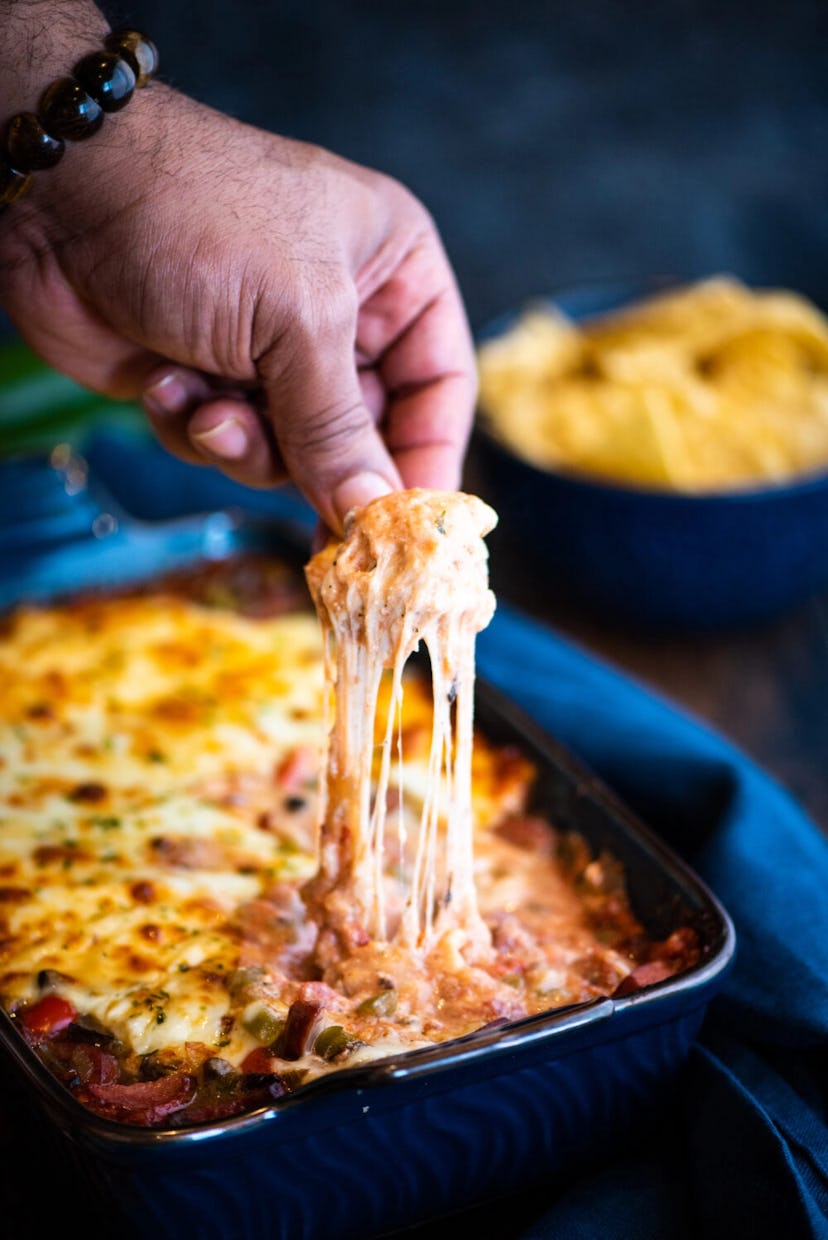 Spicy sausage and cheese dip, a delicious super bowl dip to celebrate the big game.