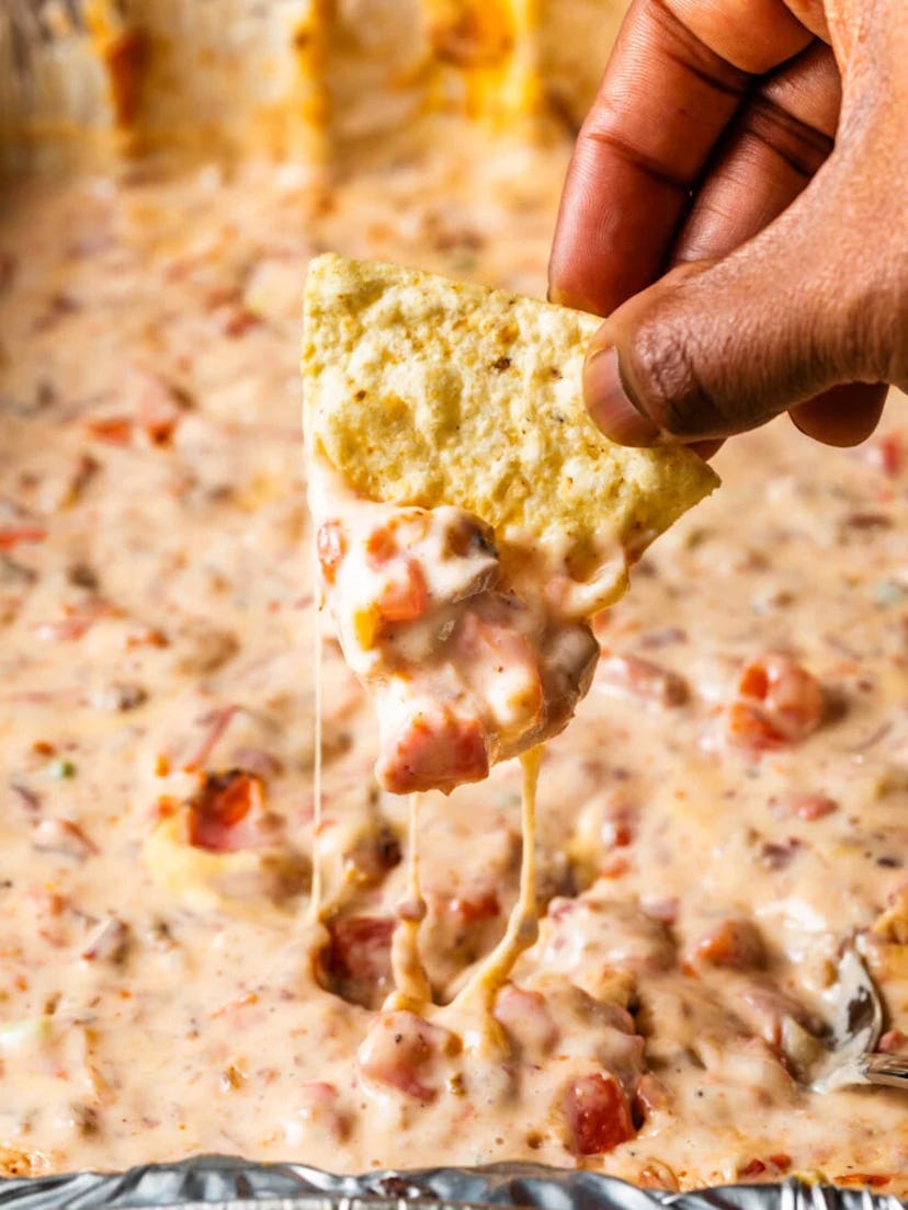 Smoked queso dip, a delicious super bowl dip to celebrate the big game.
