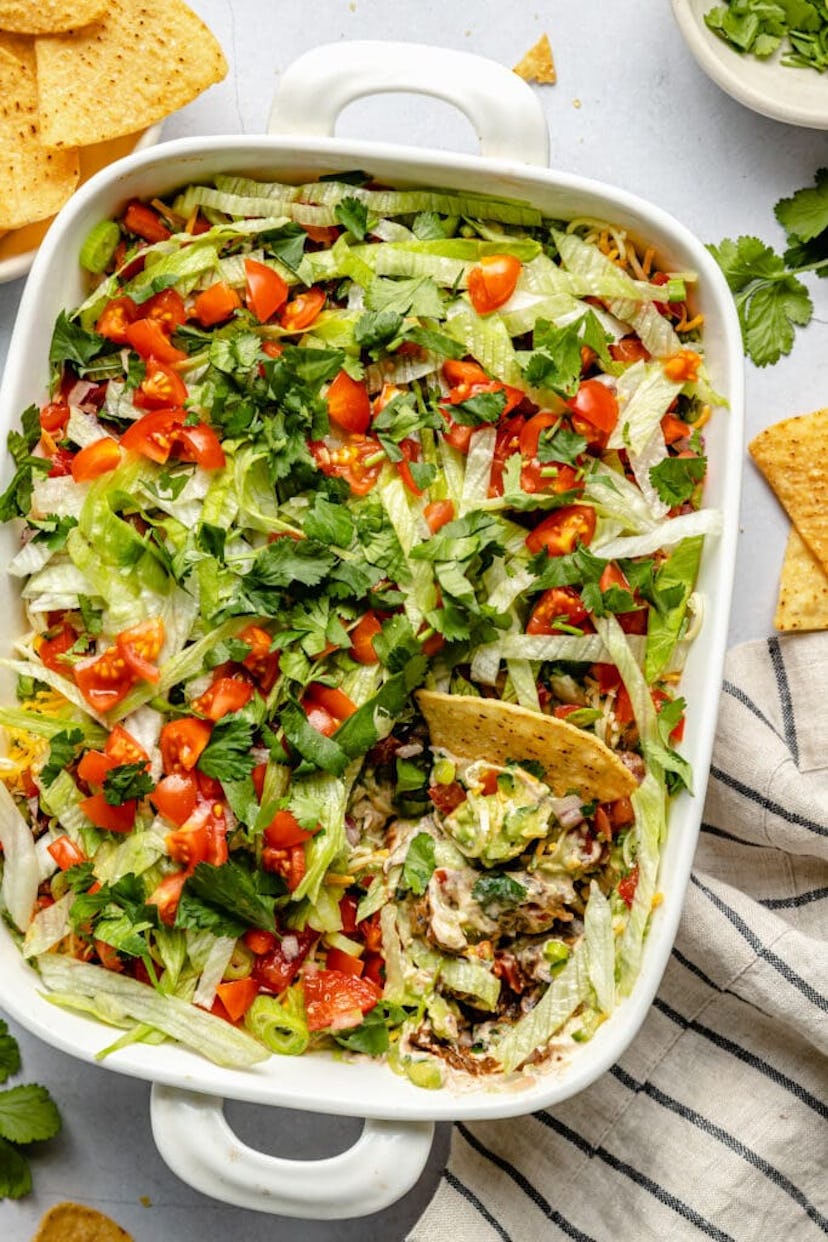 Seven-Layer Dip, a delicious super bowl dip to celebrate the big game.