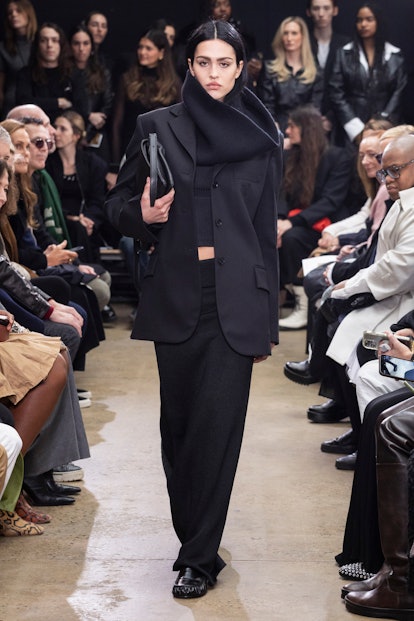 Amelia Gray in black snood, blazer and pants for Proenza Schouler show