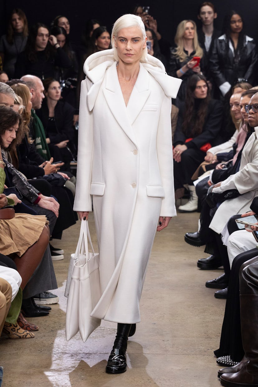 Proenza Schouler model in white hooded coat