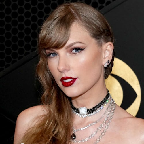 Taylor Swift's Super Bowl 2024 outfit features a saucy corset and rhinestone-studded pants.