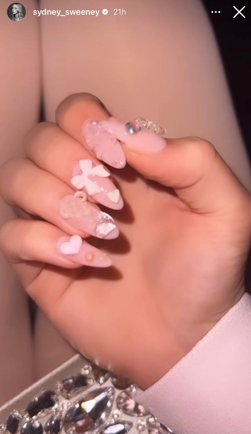 Sydney Sweeney wore "bubble bath" nails with 3D ribbons for Galentine's Day.