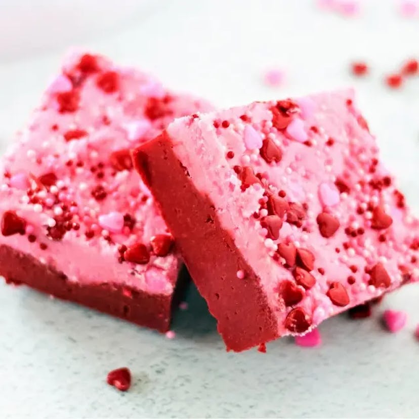 Easy Valentine's Day fudge with pink frosting, an easy Valentine's Day classroom snack idea.