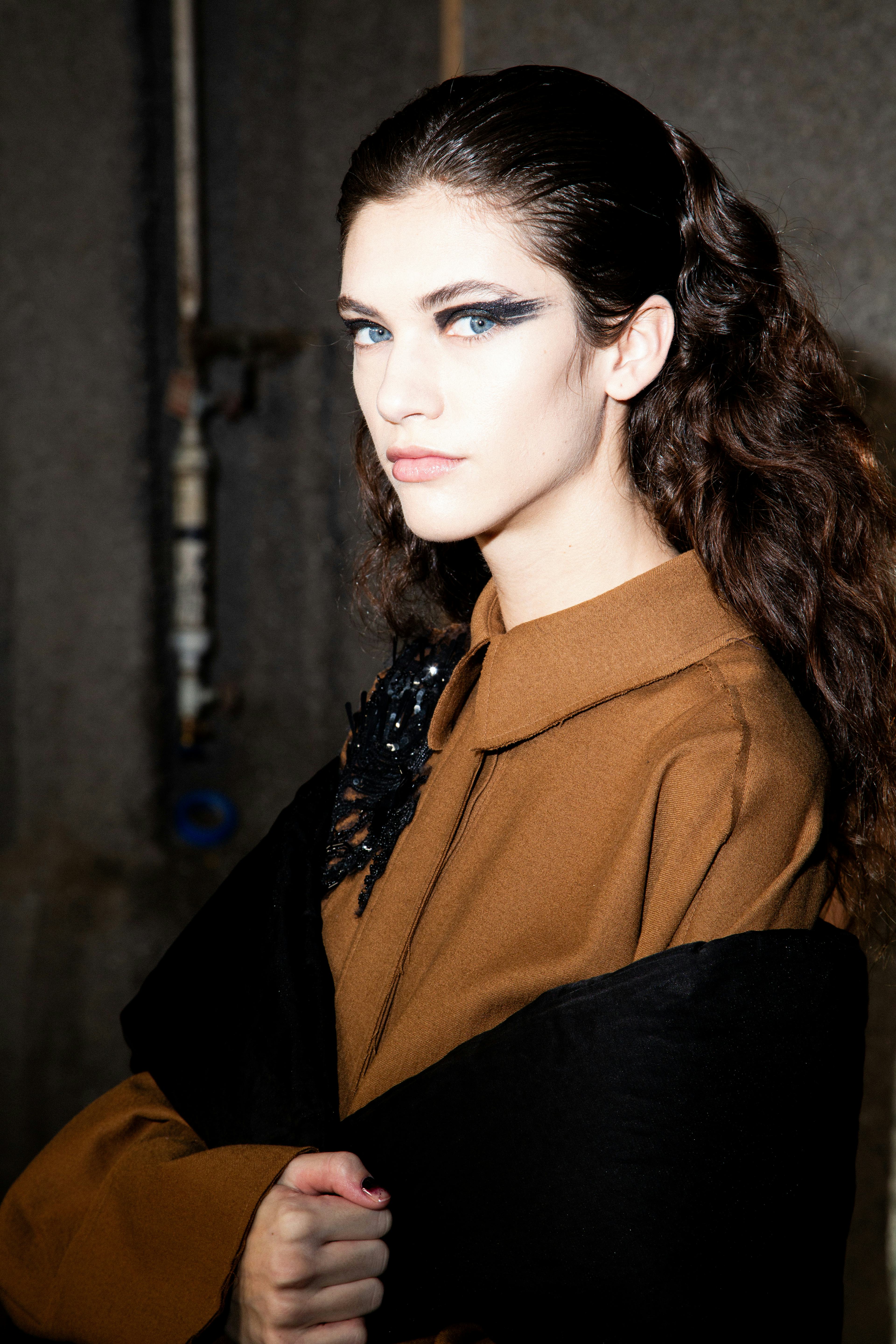 Grunge black eye makeup at Jason Wu