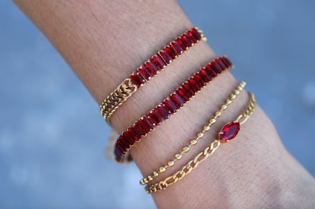 These bracelets are like the Taylor Swift bracelets she wore to the Kansas City Chiefs game. 