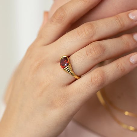 This ruby gold ring is like the one Taylor Swift wore to the Kansas City Chiefs game. 