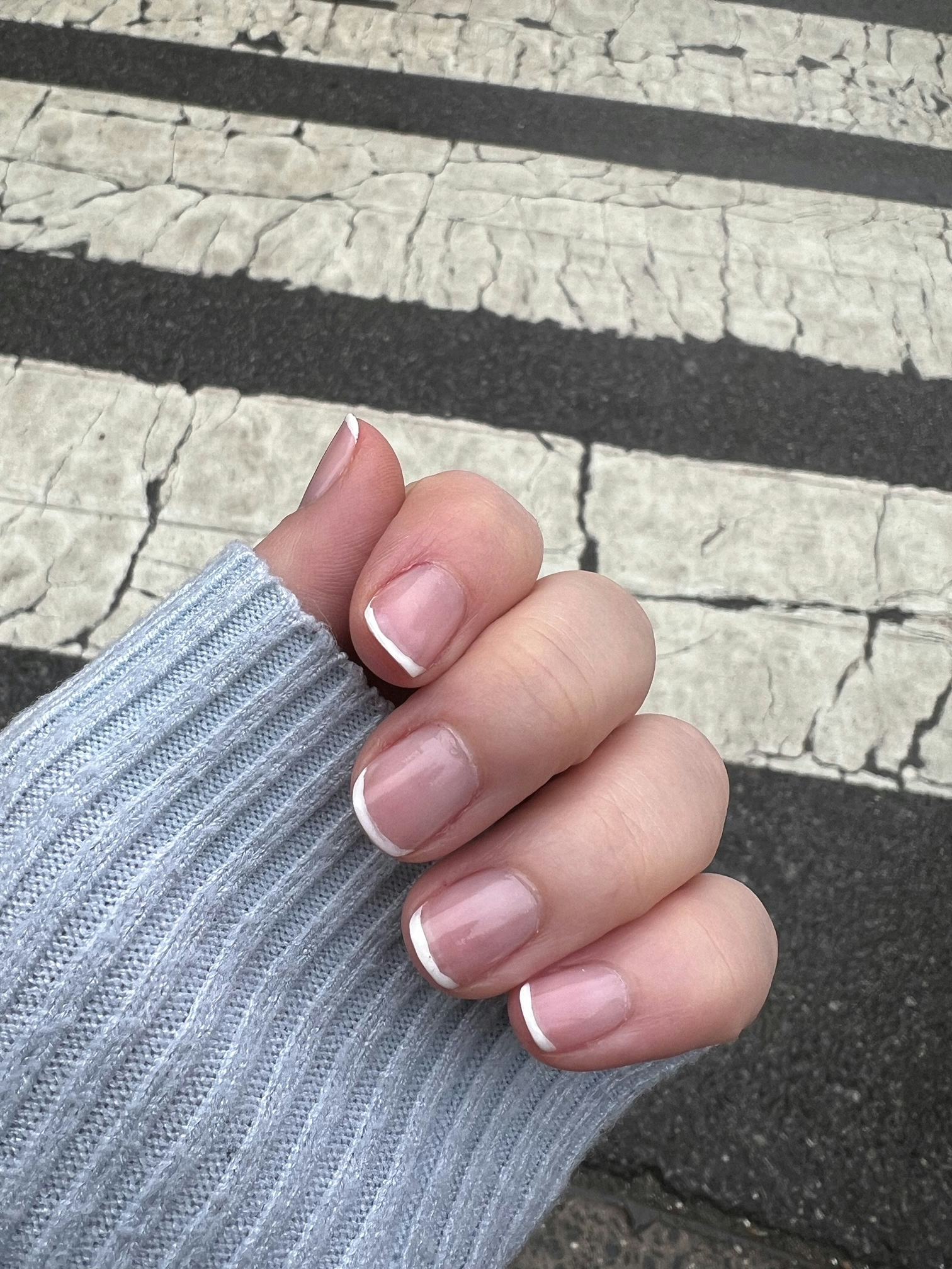 Micro French tips are easy to paint at home with the TikTok-viral $5 nail art tool.