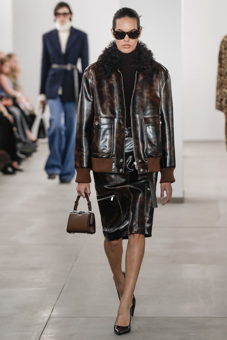 A model walks the runway during the Michael Kors Ready to Wear Fall/Winter 2024-2024 fashion show as...