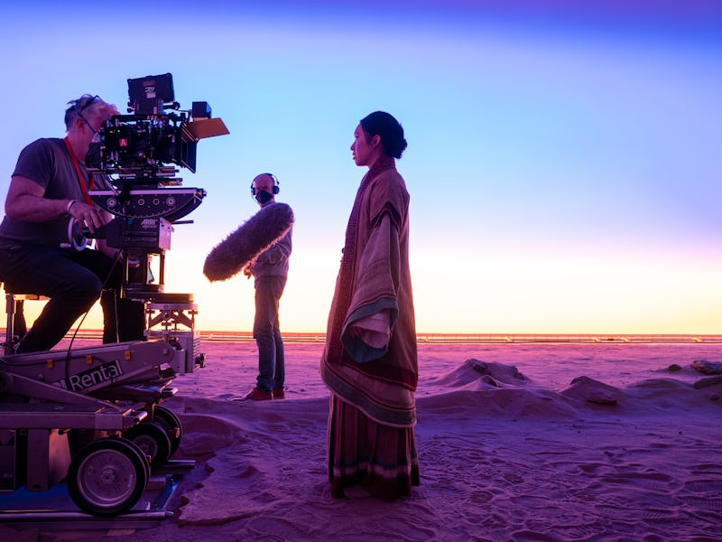 A behind-the-scenes shot of Jess Hong as Jin Cheng in episode 101 of 3 Body Problem.