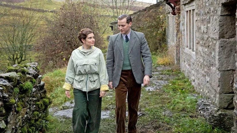 Rachel Shenton and Nicholas Ralph walking on farm in 'All Creatures Great And Small'.