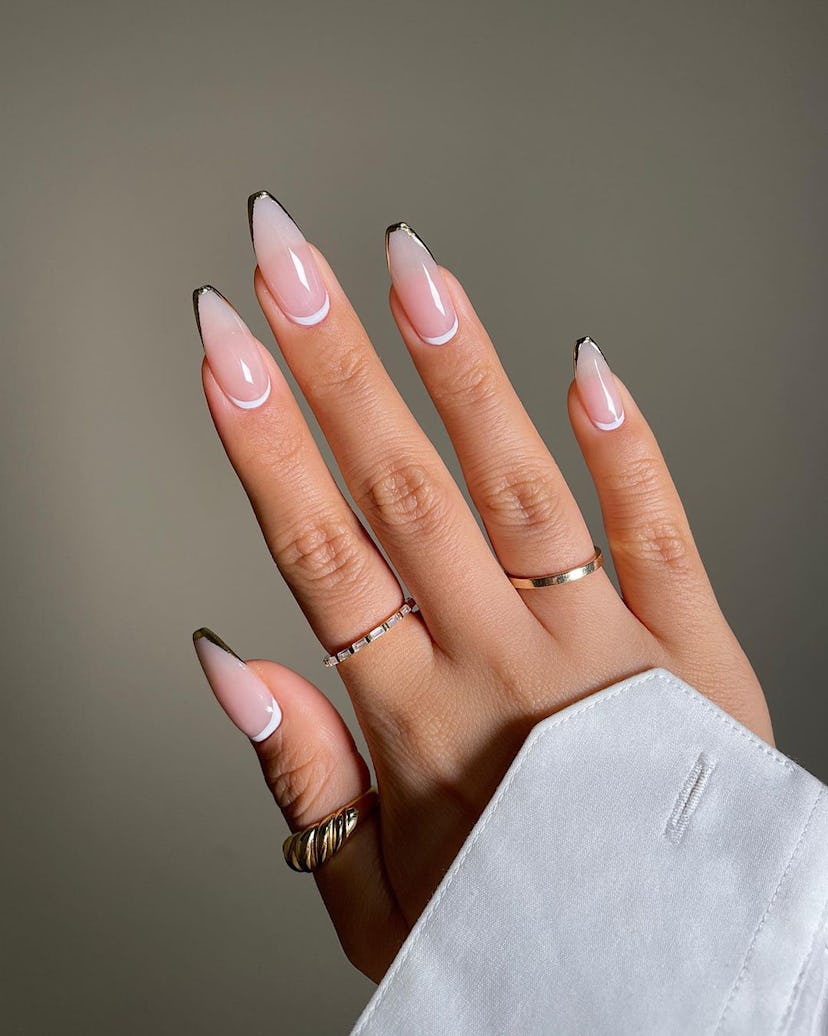 V-shaped micro French tip nails are on-trend.