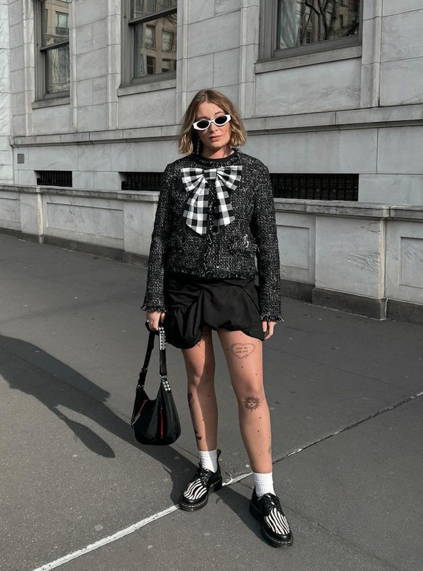 kelsey stiegman wears a tweed lady jacket and bubble skirt at new york fashion week fall/winter 2024