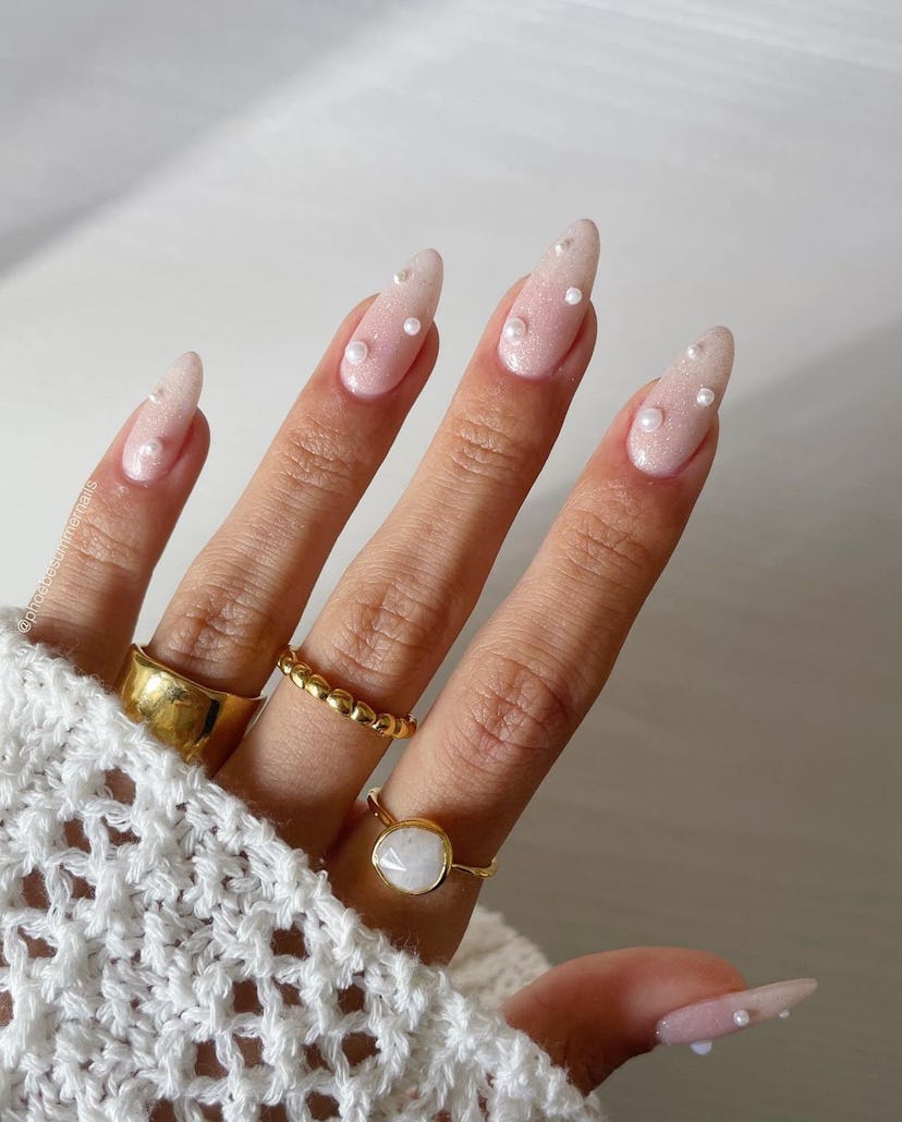Pearl encrusted nails are on-trend for Pisces season 2024.