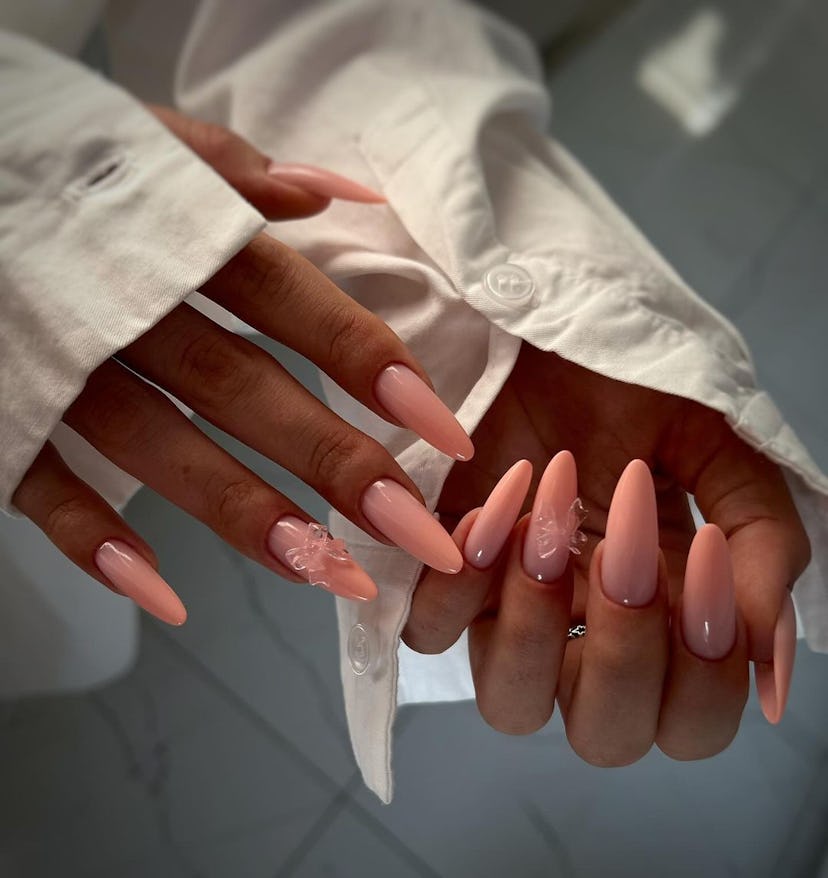 “Peach fuzz” is an on-trend nail polish color for spring 2024.