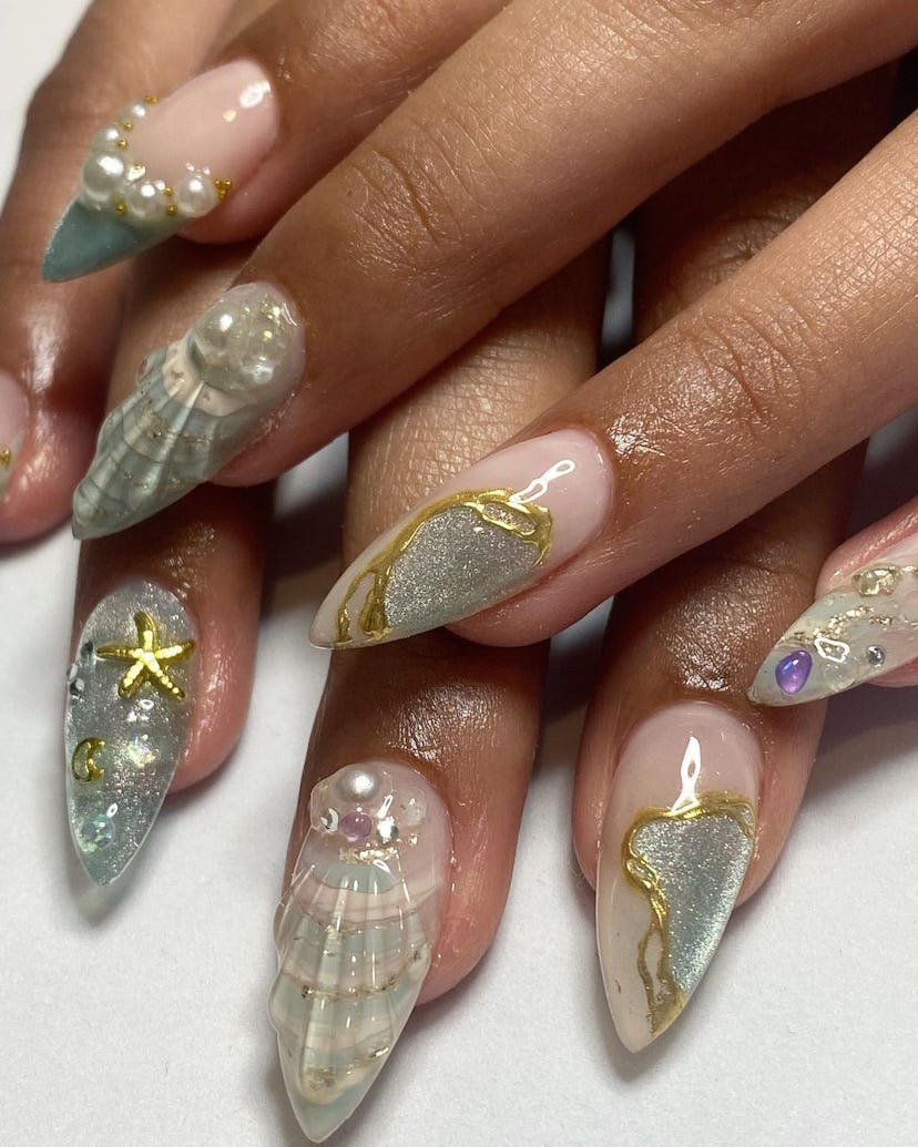"More is more" mermaidcore nails are on-trend for Pisces season 2024.