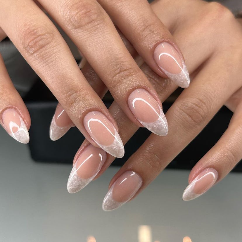 Oyster French tip nails are on-trend for Pisces season 2024.