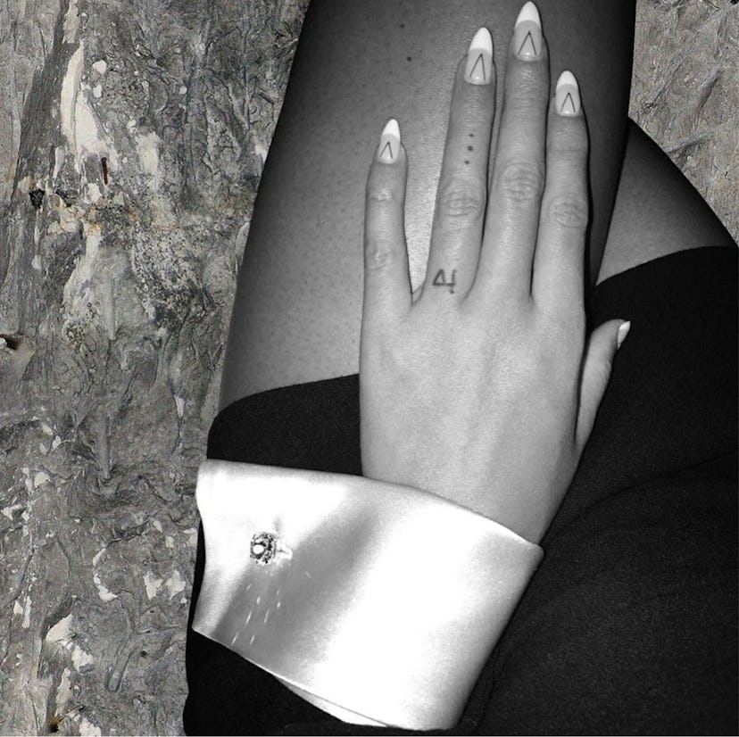 Beyonce small finger tattoos