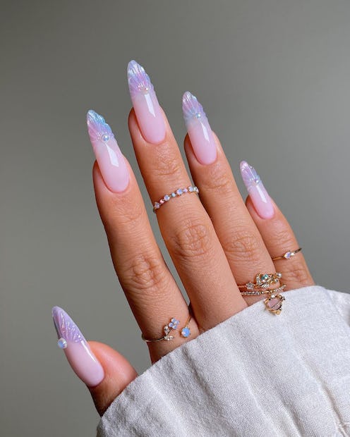 A roundup of Pisces nail art ideas that celebrate your inner siren.