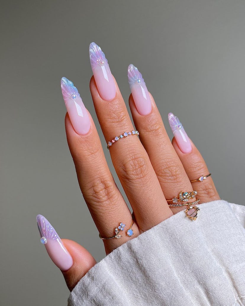 Seashell French tip nail art is on-trend for Pisces season 2024.