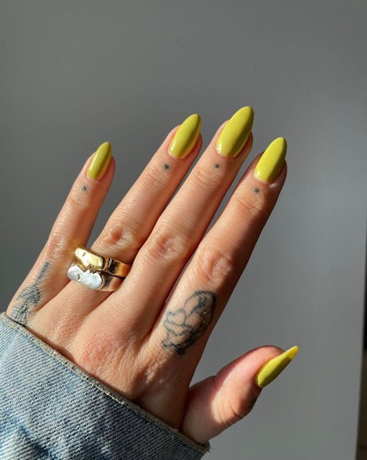 Chartreuse is an on-trend nail polish color for spring 2024.