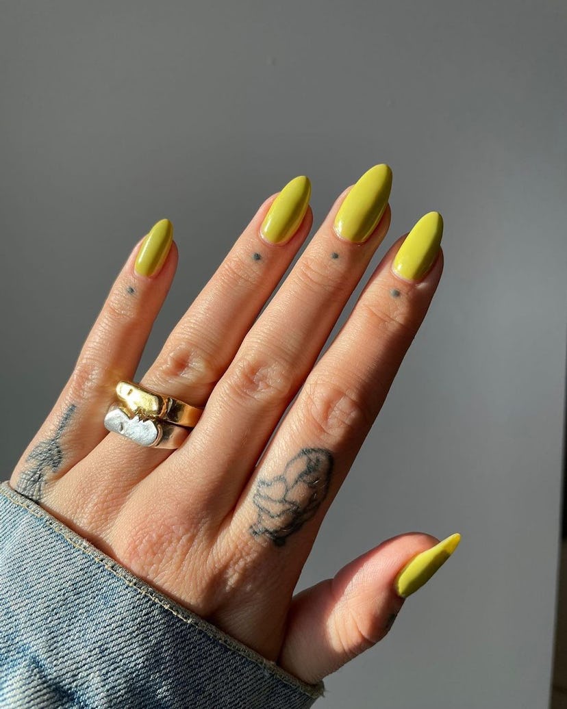 Chartreuse is an on-trend nail polish color for spring 2024.