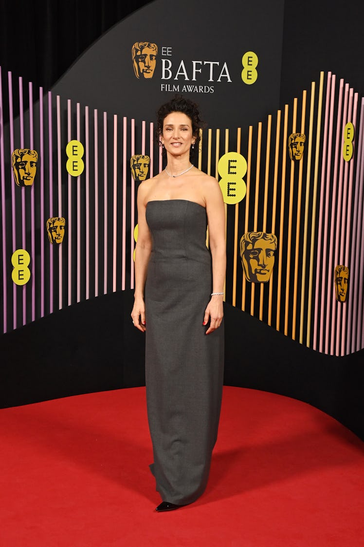  Indira Varma attends the 2024 EE BAFTA Film Awards at The Royal Festival Hall on February 18, 2024 ...