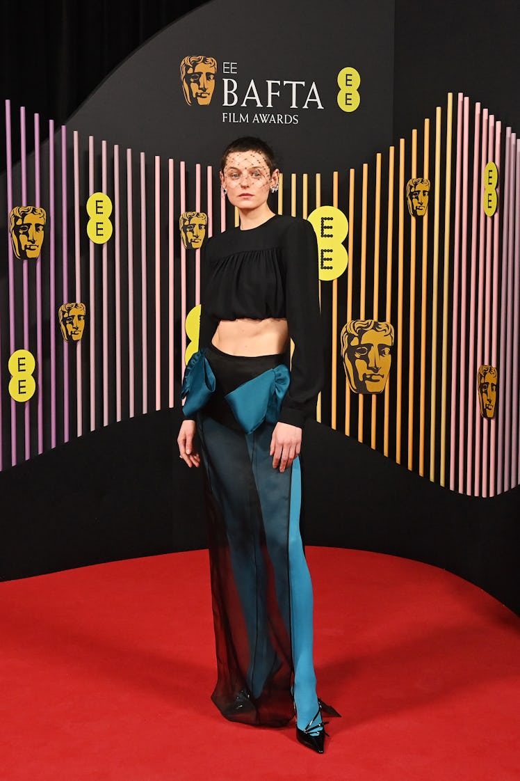  Emma Corrin attends the 2024 EE BAFTA Film Awards at The Royal Festival Hall on February 18, 2024 i...