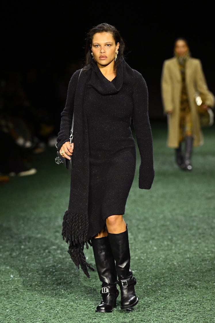 A model walks the runway at the Burberry show during London Fashion Week February 2024 at on Februar...