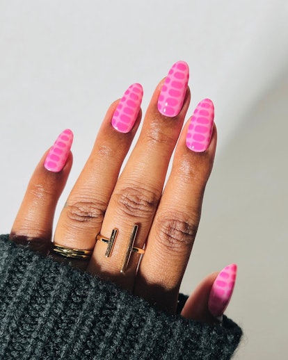 Pink croc print nails are on-trend for 2024.