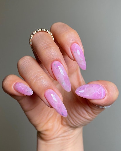 Pink rose quartz nails are on-trend for 2024.