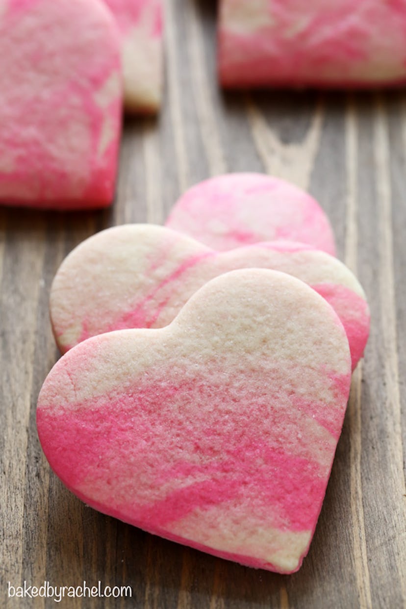 Marbled sugar cookies shaped like hearts, the perfect Valentine's Day cookies to make with kids.