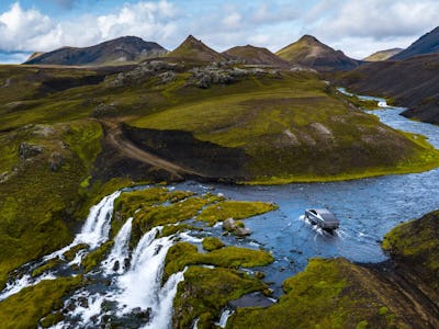 Tesla Cybertruck traversing a shallow water crossing.