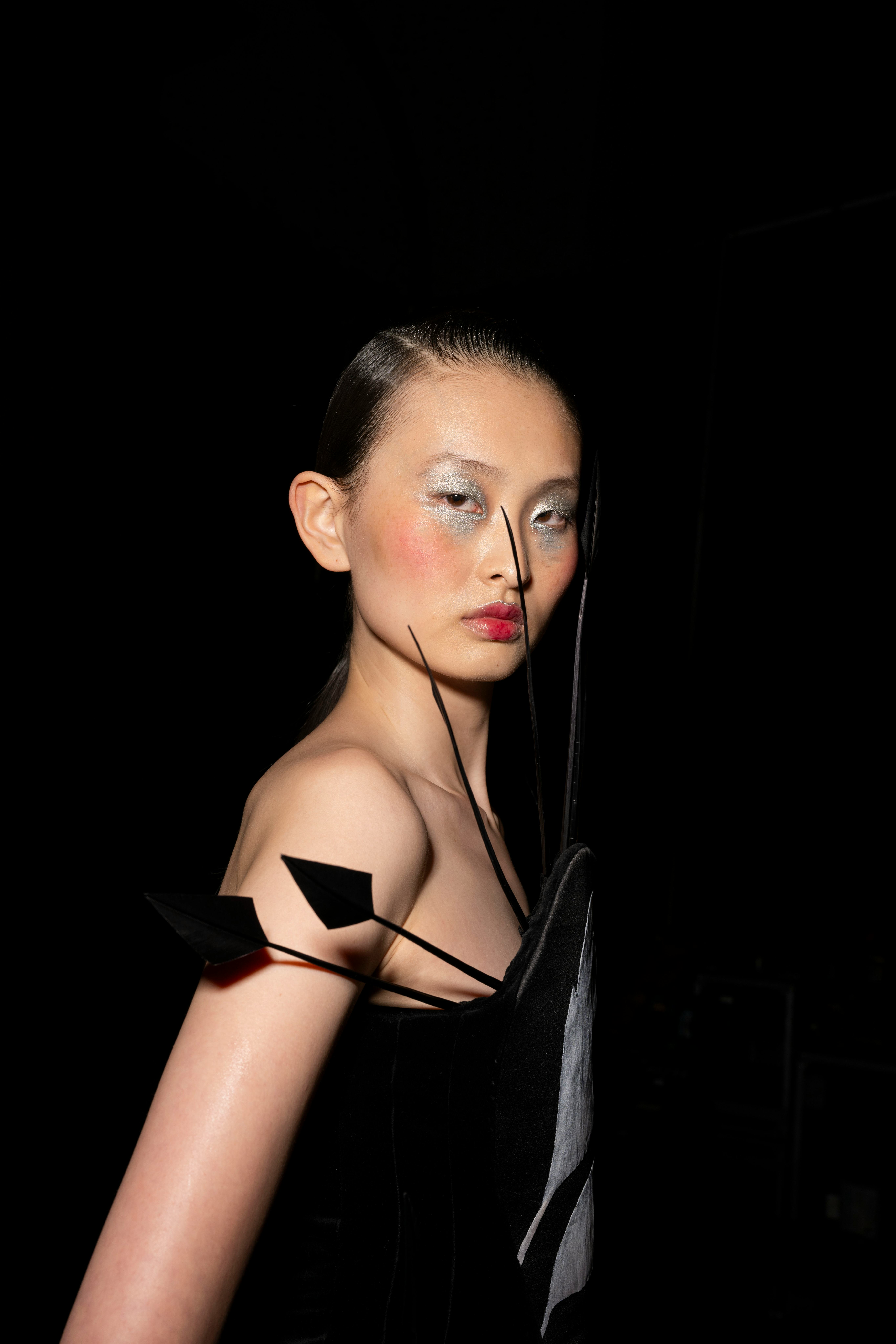 Sleek hair at Harris Reed.