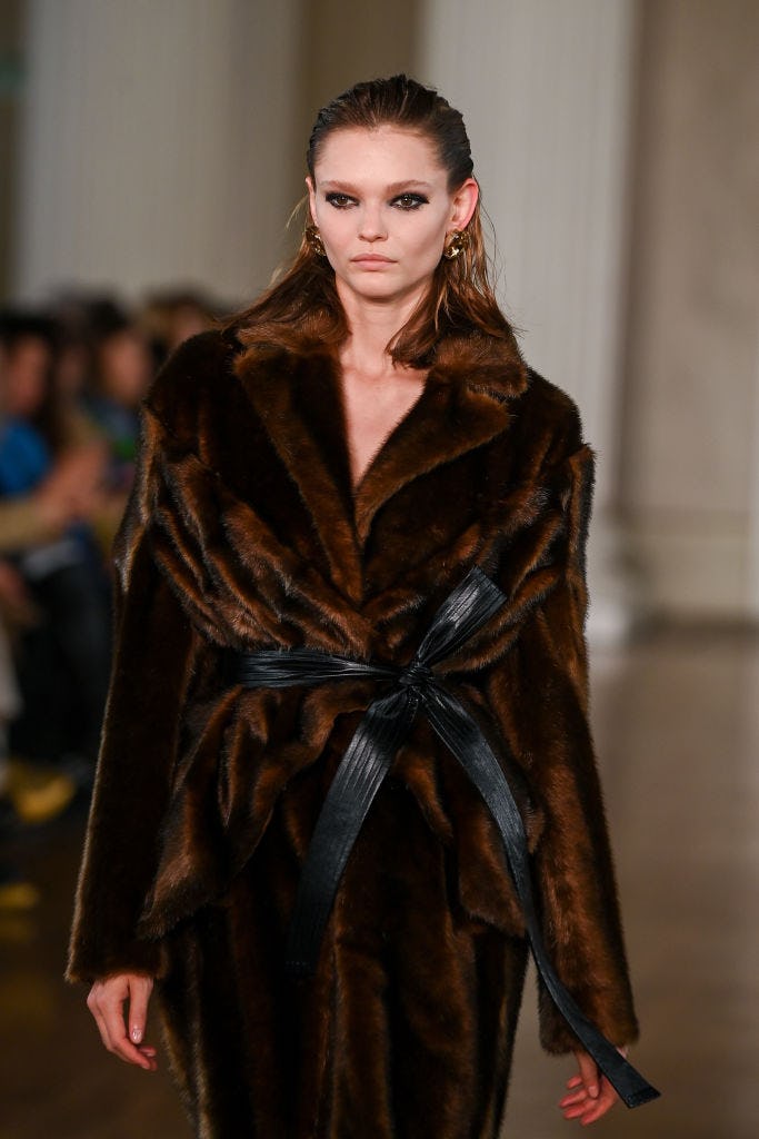 Extra thick eyeliner at Huishan Zhang.