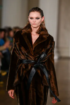 Extra thick eyeliner at Huishan Zhang.