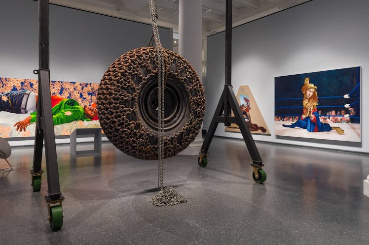 Big Wheel I by Arthur Jafa. 2018, chains, rim, hubcap, tire.