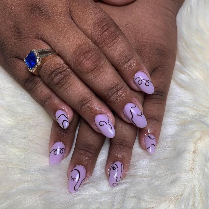 Lilac nails with fine-line doodle designs are on-trend.