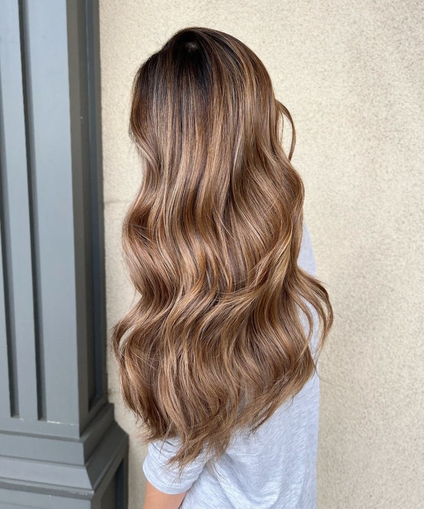Caramel bronde hair is on-trend for spring 2024.