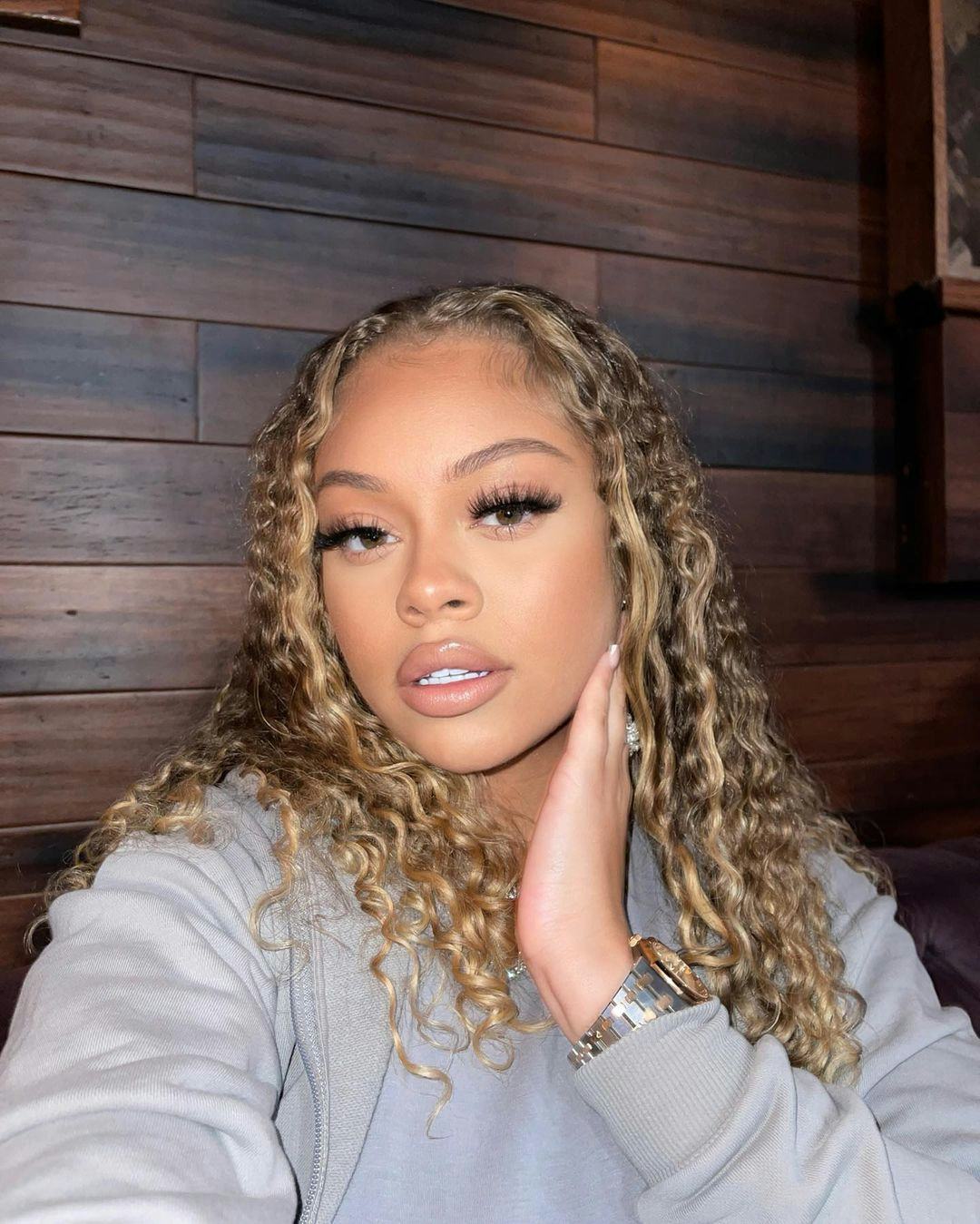 Honey blonde hair is on-trend for spring 2024.