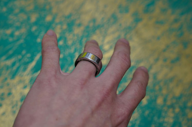 The Oura Ring Gen 3 worn on a finger.