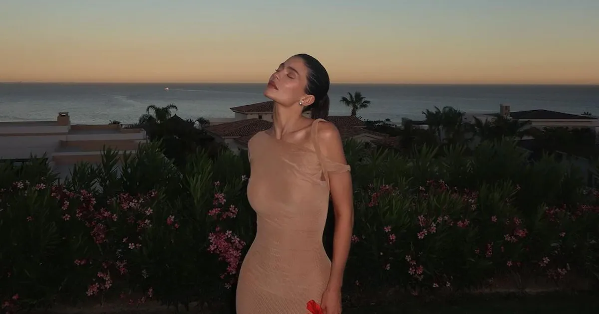kylie jenner nude pink dress Kylie Jenner Wore an Ode to Barbie in a Plunging Pink Vinyl Dress