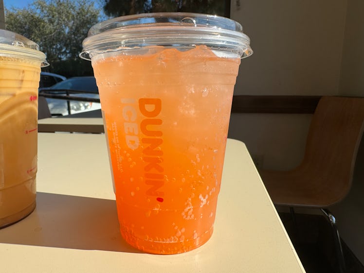 I tried Dunkin's spring menu, including the Peach Sunshine energy drink. 