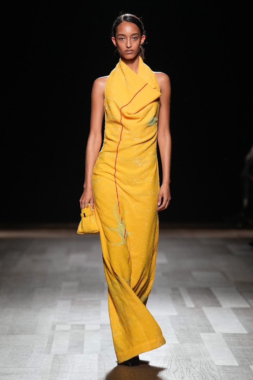 a look from ferragamo's fall 2024 collection shown at milan fashion week