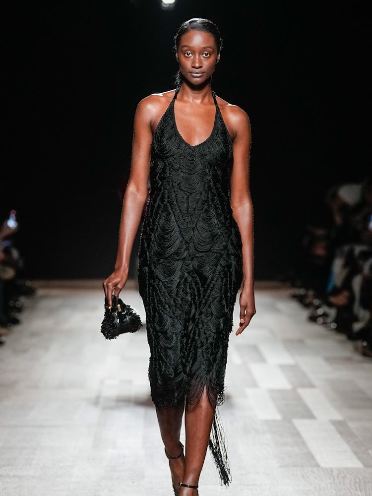 a look from ferragamo's fall 2024 collection shown at milan fashion week