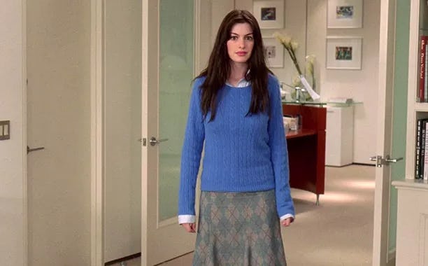 Anne Hathaway as Andy Sachs in The Devil Wears Prada.