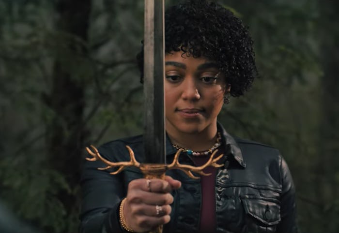 A girl holds a magic sword in 'The Spiderwick Chronicles.'