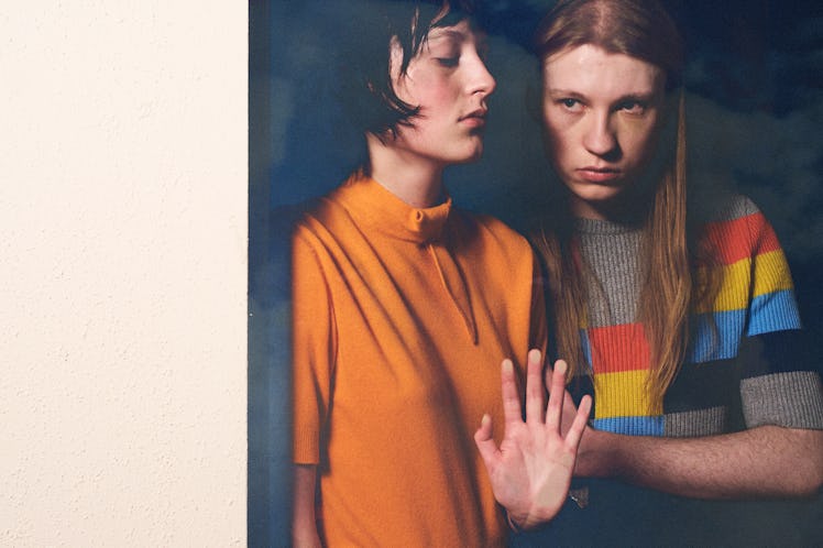 From left: Onyx B wears an Akris top. Filip wears a Loewe sweater.