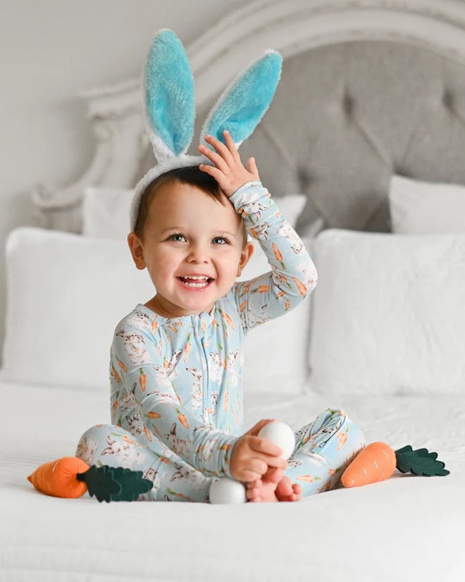 Convertible romper with bunny and carrot print, which are cute easter pajamas for babies.