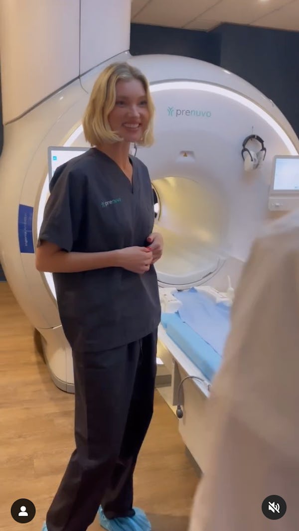 Elsa Hosk stands by the MRI machine.